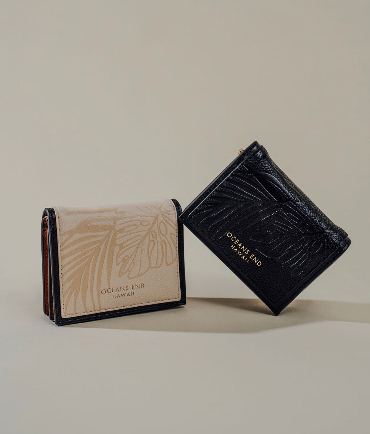 A vegan mini wallet in black and tricolor vegan leather - Oceans End