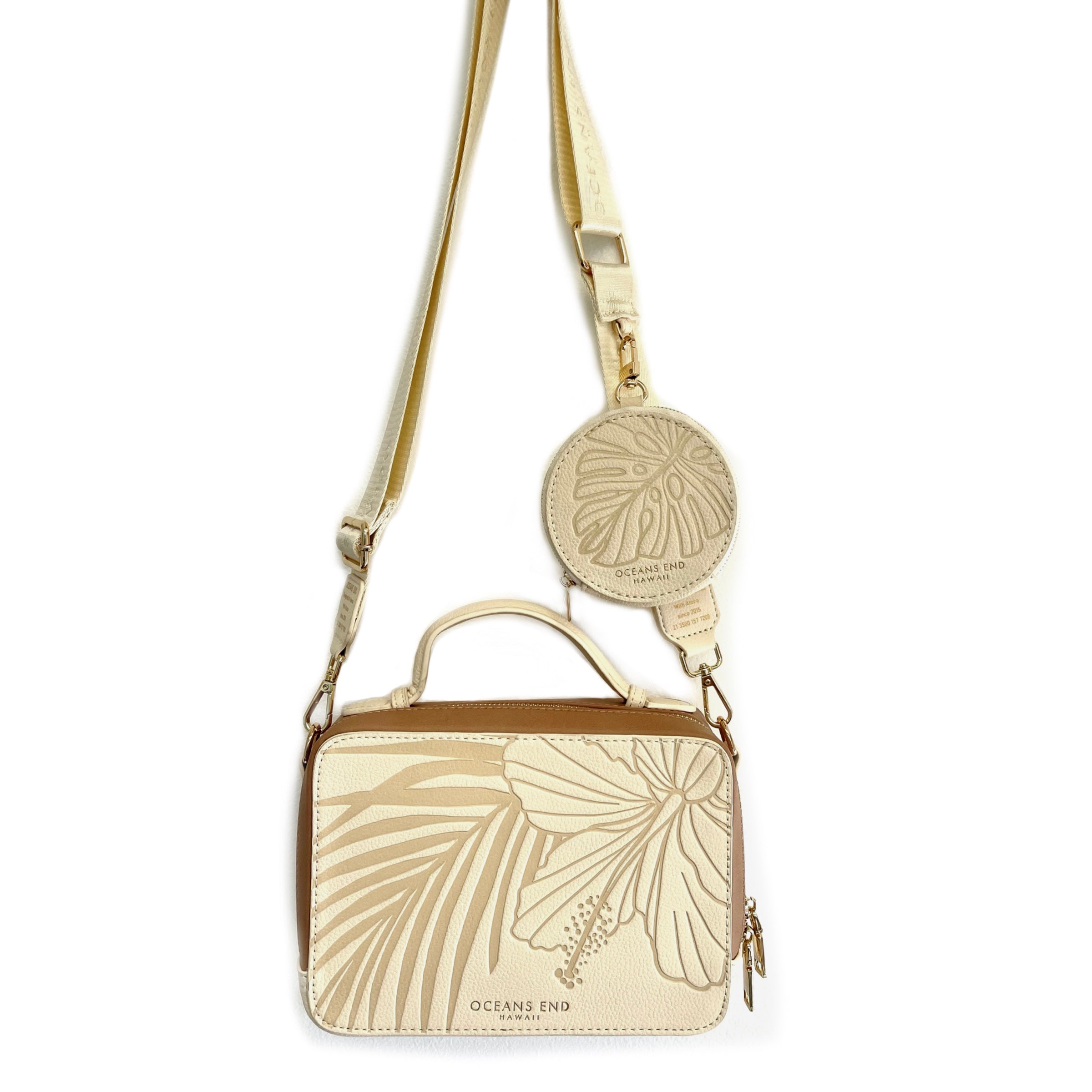 Creme crossbody camera bag with tropical flower embossed on vegan leather with Luxury Strap in creme- Oceans End